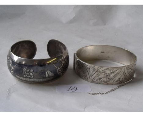 A heavy flower engraved silver bangle Birm also a  nice Niello silver torque bangle 73.7g    