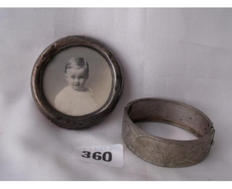 A picture frame 2.5” dia also a bangle    