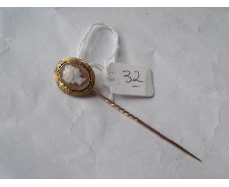 A fancy gold mounted antique cameo stick pin  2.7g inc        