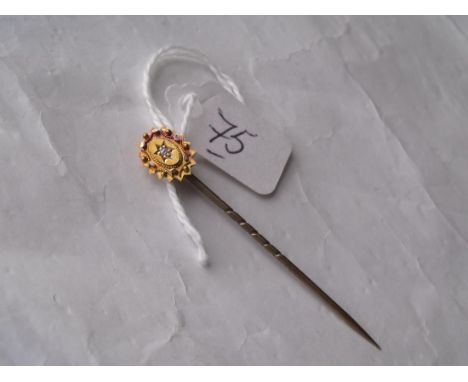 Diamond set 15ct god stick pin     