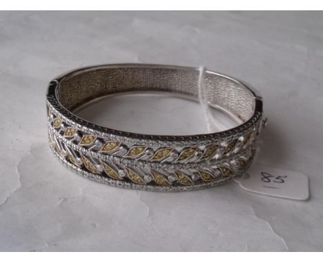 A good stone set wide silver bangle 39g    