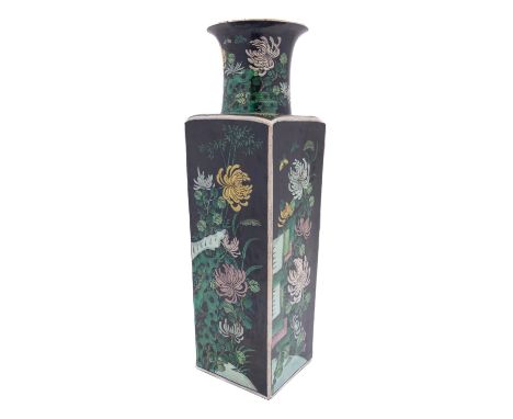 A Chinese famille noire square-section  vase painted with chrysanthemum sprays, bamboo, butterflies and rockwork on a black g