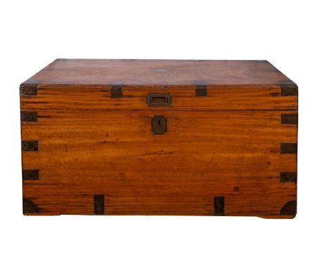 An Anglo-Indian camphorwood trunk, second half 19th century; with hinged cover; the corners and angles with metal strengtheni