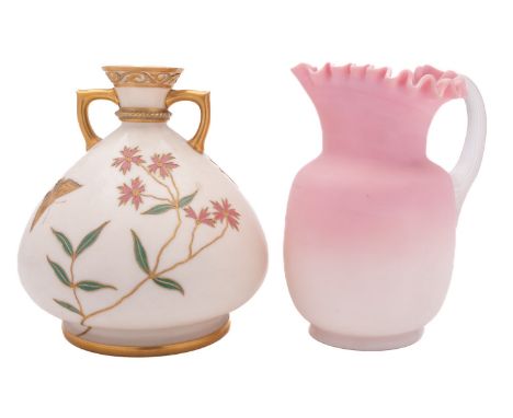 A Royal Worcester porcelain two handled vase decorated and gilded with blooms and butterflies on an ivory ground, green backs