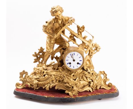 A mid-Victorian gilt-metal clock the eight-day duration movement striking the hours and half-hours on a bell with an outside 