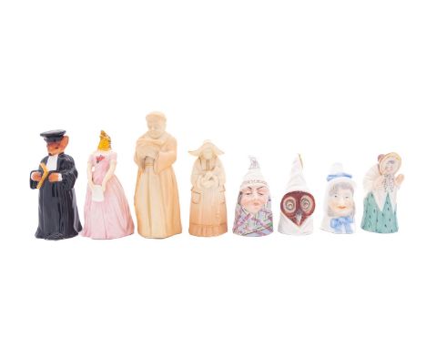 Eight Royal Worcester candle extinguishers, comprising a blush ivory Monk and Nun [the latter unmarked], Mr and Mrs Caudle, M