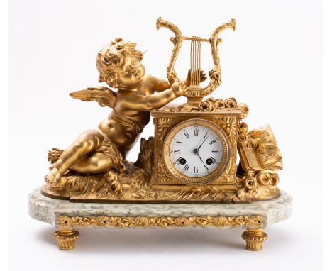 A mid-Victorian gilt-metal and marble mantel clock the eight-day duration movement striking the hours and half-hours on a bel