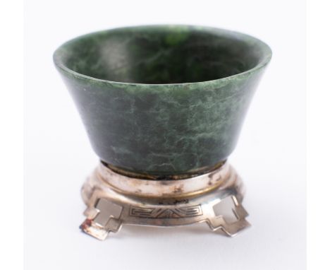 Edward I Farmer, New York. A small silver mounted spinach green jade cup with everted rim, the pierced stand of geometric des