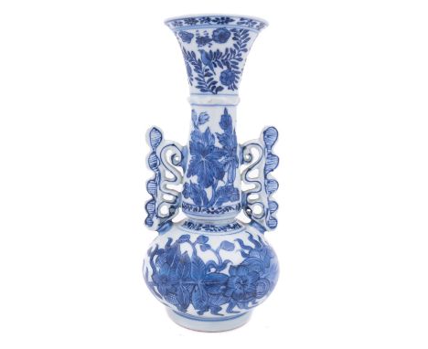 A Chinese blue and white vase, Kangxi in the manner of Venetian glass with pierced wing handles, compressed globular lower bo