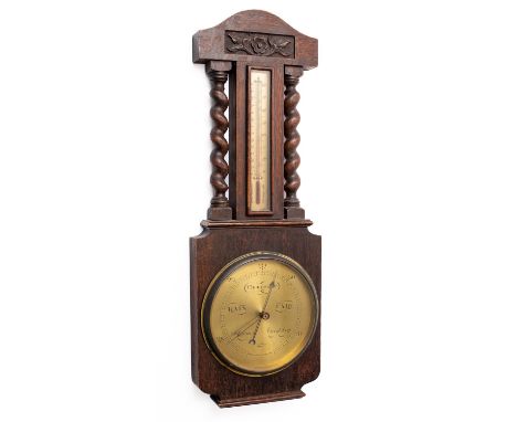 An oak wall barometer the round brass dial engraved with barometric markings and signed Jay's, Charlotte Street, London, the 