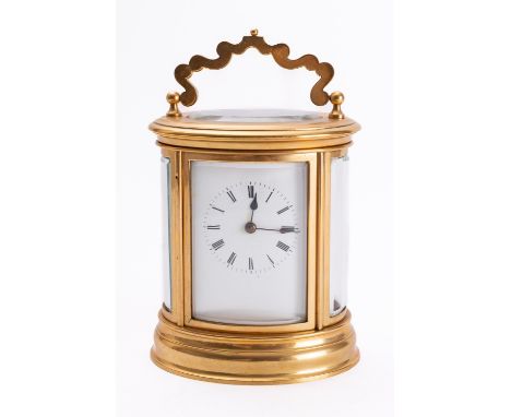 A French late-Victorian oval brass carriage clock the eight-day duration movement having a platform cylinder escapement and s