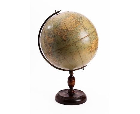 A Philips 13 1/2" terrestrial Challenge Globe, first half 20th century; with calibrated brass meridian and polar discs; on a 