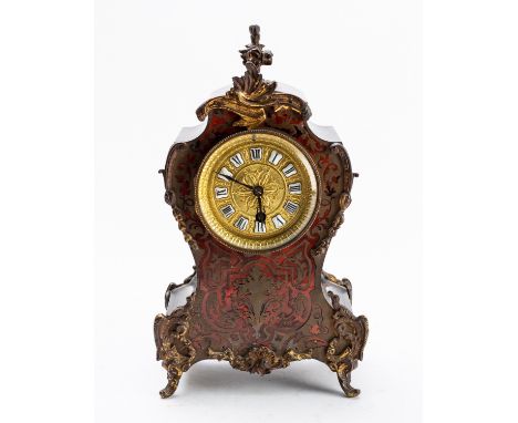 A French mid-Victorian boulle mantel clock having an unsigned eight-day duration timepiece movement, the cast-brass gilded di