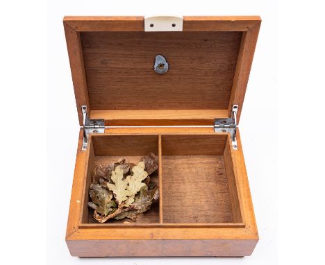 A Regency walnut and banded tea caddy, circa 1815; of sarcophagus form, 16cm high, 25cm wide; a Victorian walnut and Tunbridg