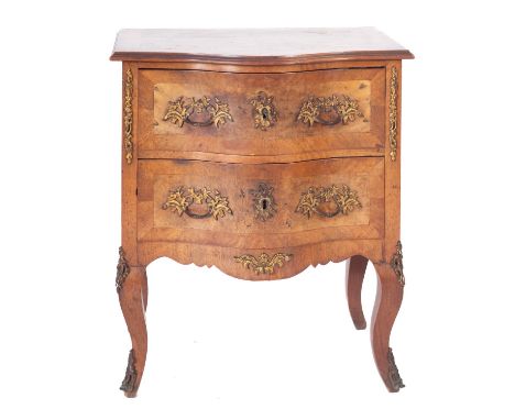 A French walnut, crossbanded and gilt meal mounted serpentine fronted petit commode, the quarter burr veneered top with a mou