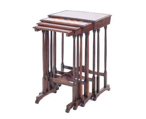 A set of Regency rosewood quartetto tables, with rectangular moulded tops, the second size table inlaid for chess with birds 