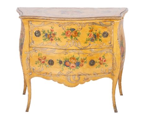 A Continental cream lacquer and decorated bombe commode, of serpentine outline, painted with sprays of flowers and foliage in