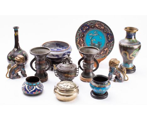 A mixed lot of Chinese and Japanese cloisonne and champleve enamel together with a Chinese brass handwarmer, late 19th/20th c