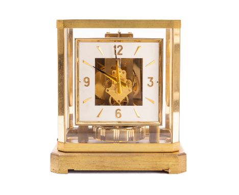 Jaeger-LeCoultre Atmos clock the square cream dial with baton and Arabic numerals and gilt-brass delphine hands, the movement