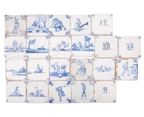 A group of twenty-two Dutch and English blue and white delftware tiles painted with figural subjects including workmen, bibli