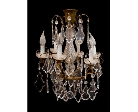 A gilt metal and glass hung six light chandelier, in Louis XV taste, by Baccarat, 20th century; the electrical fitments in lo