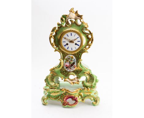 A Jacob Petit style French mid-Victorian mantel clock on base the eight-day duration movement striking the hours and half-hou