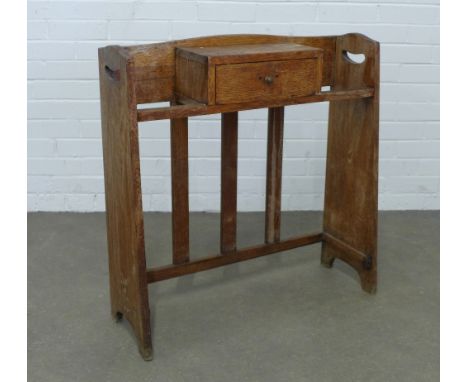 An Arts &amp; Crafts oak stick stand, 77 x 80 x 27cm.