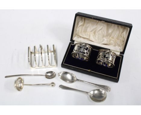 Birmingham silver toast rack and a cased set of two silver napkins by William Hutton and Sons, Sheffield 1908, three silver t