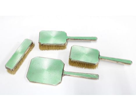 George V silver and green enamel backed four piece dressing table brush set, London 1934 (4)