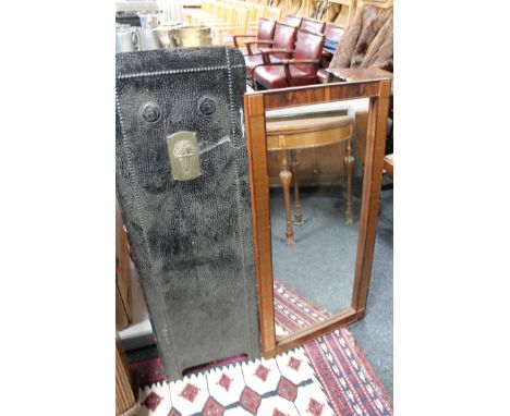 A rosewood framed mirror and a folding metal fire screen