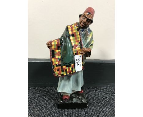 A Royal Doulton china figure : Carpet Seller, HN 1464, height 23 cm. 