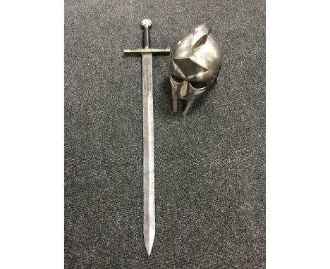 A reproduction Gladiator helmet and a reproduction broad sword 