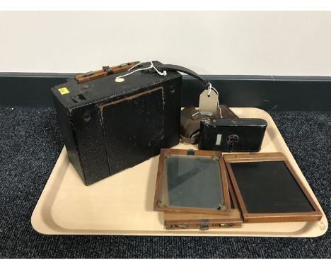 A plate camera with plates together with a Rollette camera 