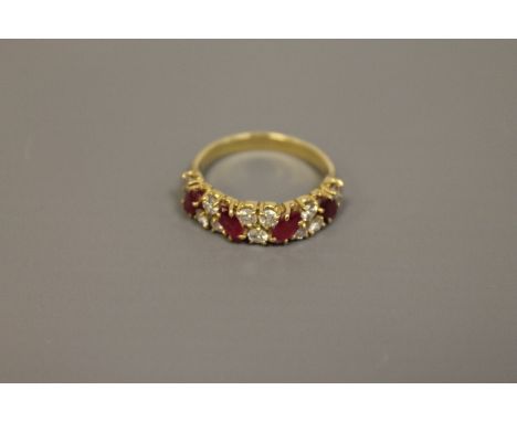 An 18ct gold ruby and diamond ring