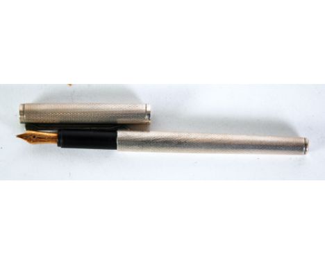 DUNHILL, GERMANY SELF FILL FOUNTAIN PEN, in engine turned bright metal case and having Dunhill 14ct gold nib with scroll deco
