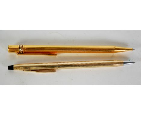 MUST DE CARTIER ROLLED GOLD CASED BALL POINT PEN, with reeded case having screw top to advance and with draw the ball point  