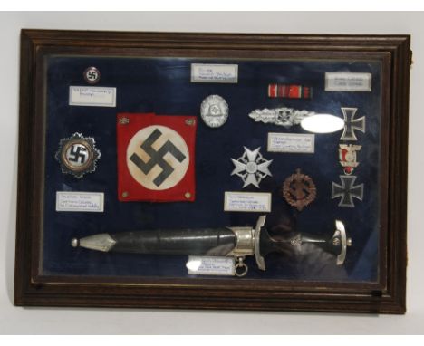 GLAZED DISPLAY CASE CONTAINING THIRD REICH MEMORABILIA, including a Nazi Shutzstaffel 1936 pattern dagger and sheath; an Iron