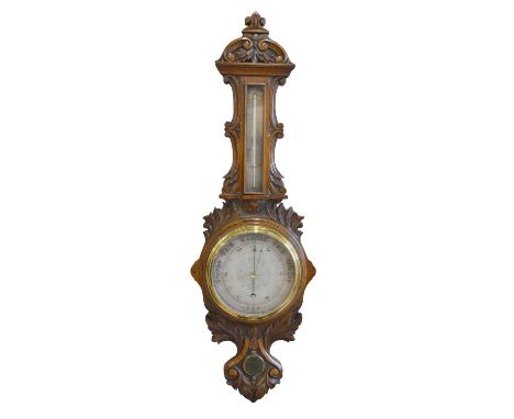 Aneroid Barometer presented to William Watkin Wynne Late 19th century carved oak aneroid wheel barometer, 8" silvered dial wi