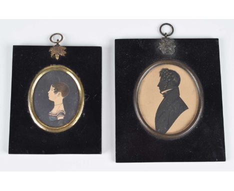 English School (19th century) A portrait miniature and a silhouette Unsigned, oval, ink and watercolour on paper and a cut-pa