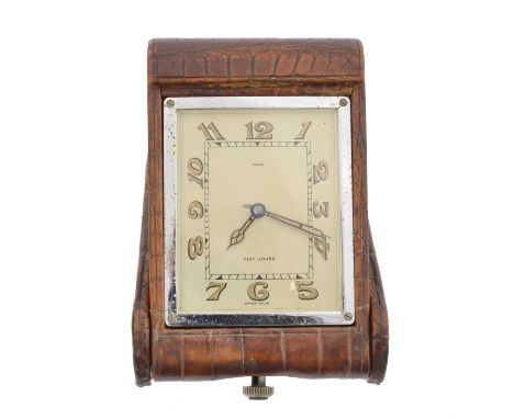 A Jaeger-LeCoultre travel clock, A Jaeger-LeCoultre travel clock, the rectangular cream dial with Arabic numerals, eight day 