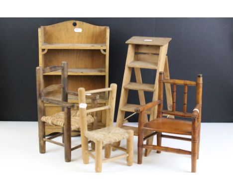 Vintage wooden dolls furniture - A dresser, step ladders, two chairs with rush seats and a bamboo-style chair (dresser approx