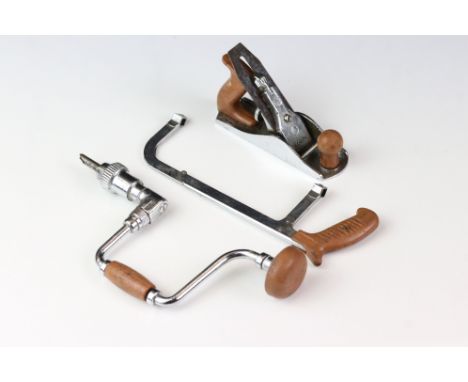 Three vintage miniature hand tools by MARX to include drill, plane and saw. 