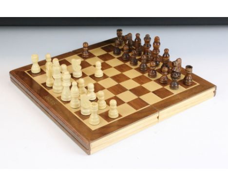Jaques London folding wooden chess board having a full set of matching turned wooden chess pieces. King measures 6.4cm. 