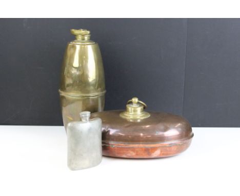 A small collection of mixed metal ware to include a copper foot warmer, brass water bottle and a pewter hip flask. 