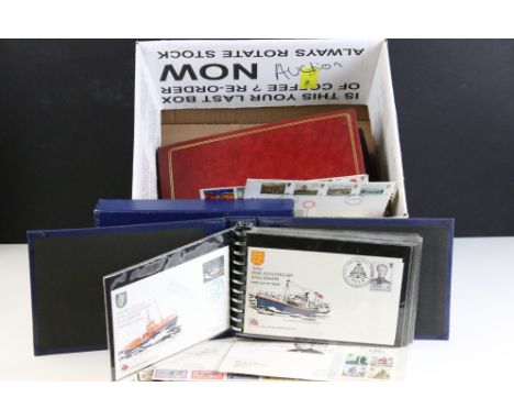 Assortment of first day covers and stamps to include approx. 10 stamp presentation packs, selection of first day covers acros