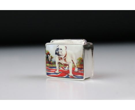 A silver and enamel pill box with British bulldog image. 