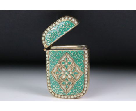 A brass and enamel vesta case. 