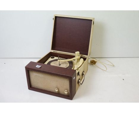 Collaro high fidelity portable record player set within a red and white faux leather case. 