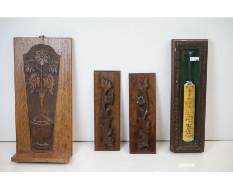 Early 20th century oak hanging wall panel with central carved panel depicting flowers in an urn, shelf to base (approx 57cm h