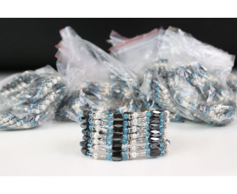 A collection of approx twenty contemporary light blue coloured magnetic bracelets. 